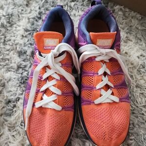 Nike Kids Flyknit Orange and Purple Sneakers